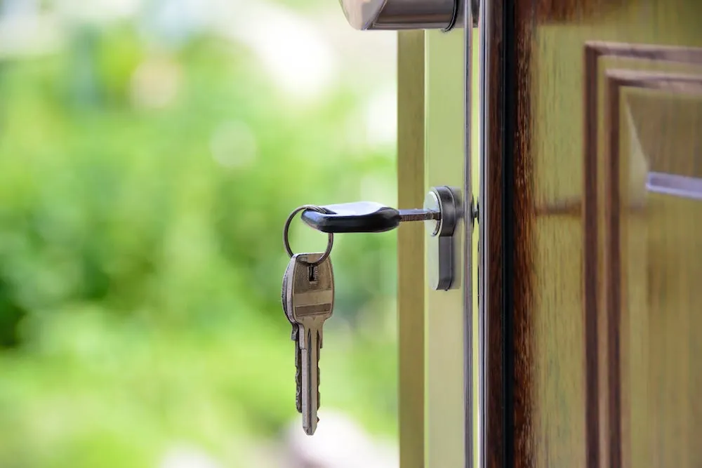 key in door lock opening home